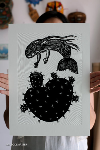 linoleum print by Alec Dempster on extra heavyweight paper with mermaid  and cactus